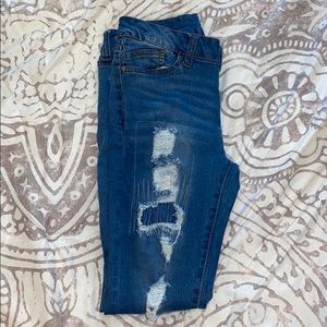 mid-wash ripped skinny jeans